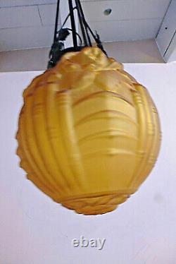 Ancienne suspension fer forgé et globe verre ambre Art déco